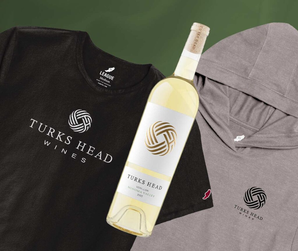 Turks Head Wines branded black shirt, wine bottle, and grey hoodie