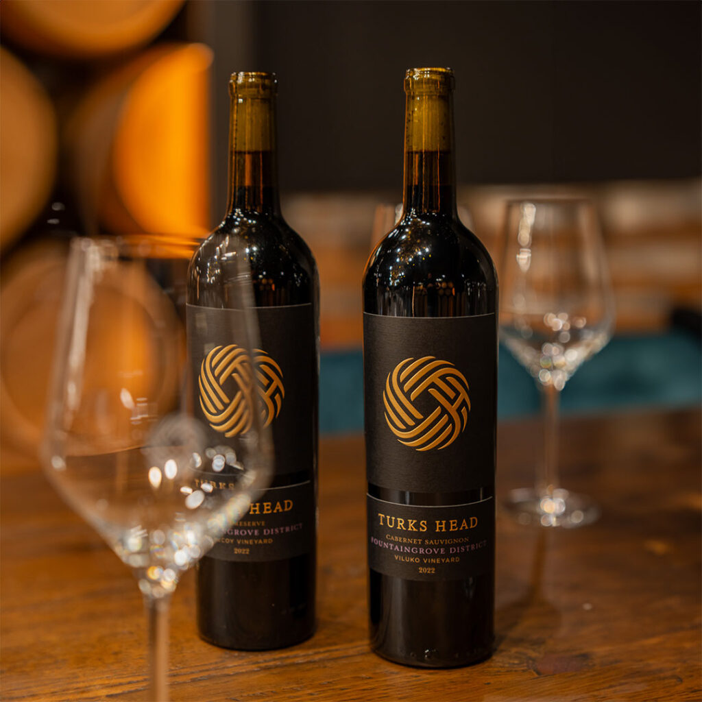 bottles of 2022 Cabernet Sauvignon Viluko Vineyard inside the barrel room