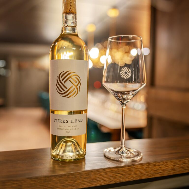 glass and bottle of 2023 Sauvignon Blanc Exposition East